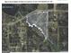 Aerial view showcasing property boundaries and proximity to Nash Creek Pond at 225 Banks Rd, Fayetteville, GA 30214