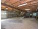 Spacious basement with high ceilings, garage door, and potential for customization at 225 Banks Rd, Fayetteville, GA 30214