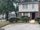 Exterior with brick facade, shuttered windows, and sidewalk leading to the front door at 923 Regal Path Ln, Decatur, GA 30030