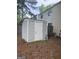 Backyard featuring a storage shed and privacy fence at 923 Regal Path Ln, Decatur, GA 30030