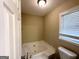 Bathroom with a jetted tub at 246 Bridgewood Se Dr, Conyers, GA 30094