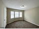 Neutral bedroom featuring a large window bay that allows for natural light at 246 Bridgewood Se Dr, Conyers, GA 30094