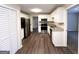 Updated kitchen features stainless steel appliances, granite countertops, and ample cabinet space at 246 Bridgewood Se Dr, Conyers, GA 30094