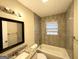 Well-lit bathroom featuring tiled walls, modern fixtures, and a vanity with granite top at 2922 Dale Pl, Decatur, GA 30032