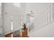 Bright foyer featuring hardwood flooring, stairway, and natural light at 3426 Bridle Brook Drive Ne Dr, Auburn, GA 30011