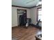 Bedroom area with exercise equipment and closet at 9000 Edinburg Dr, Winston, GA 30187