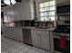 Gourmet kitchen with stainless steel appliances and granite countertops at 9000 Edinburg Dr, Winston, GA 30187