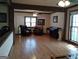 Spacious living room with hardwood floors, comfortable seating, and plenty of natural light at 9000 Edinburg Dr, Winston, GA 30187