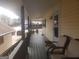 Inviting covered porch perfect for enjoying the outdoors in comfort at 9000 Edinburg Dr, Winston, GA 30187
