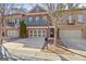 Charming brick townhome with a two-car garage, beautiful shutters and a well-maintained front yard and brick mailbox at 44 Star Spangled Ln, Peachtree City, GA 30269
