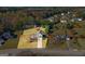Aerial view of a well-manicured property with lush landscaping and mature trees at 1022 Gloria Grand Blvd, Mcdonough, GA 30252