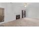 Spacious bedroom with carpeting, neutral walls, and a private entrance to backyard at 1022 Gloria Grand Blvd, Mcdonough, GA 30252