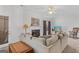 Bedroom with carpet, fireplace, neutral walls, and ceiling fan at 1022 Gloria Grand Blvd, Mcdonough, GA 30252