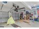 Spacious garage with storage racks and ample room for vehicles at 1022 Gloria Grand Blvd, Mcdonough, GA 30252