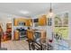 Cozy kitchen featuring stainless steel appliances, tile flooring, and a breakfast nook at 1022 Gloria Grand Blvd, Mcdonough, GA 30252