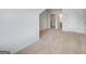 Spacious carpeted bedroom with multiple doors to closets and en-suite bathroom at 1724 Goodwin Dr # 74, Hampton, GA 30228