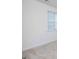 Cozy bedroom featuring neutral carpet, a window with blinds, and ample natural light at 1724 Goodwin Dr # 74, Hampton, GA 30228
