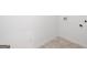 Utility area ready for washer and dryer, with a tiled floor at 1724 Goodwin Dr # 74, Hampton, GA 30228