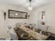 Elegant dining room with a modern chandelier and a beautifully set table at 141 Whistle Way, Locust Grove, GA 30248