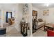 Hallway featuring stylish console table and decor with a partial view of the living room at 141 Whistle Way, Locust Grove, GA 30248