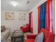 Relaxing living room featuring a comfortable sofa and stylish decor at 141 Whistle Way, Locust Grove, GA 30248