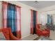 Comfortable living room featuring modern curtains and cozy seating arrangements at 141 Whistle Way, Locust Grove, GA 30248