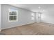 Bright bedroom featuring neutral walls, plush carpeting, and natural light at 4856 Station Ln # 21, Union City, GA 30349