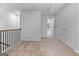 Second floor hallway boasts carpeted floors, white doors, and natural light at 4856 Station Ln # 21, Union City, GA 30349