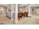 Spacious basement with bar area, open layout, and neutral colors throughout at 550 Wentworth Ct, Fayetteville, GA 30215