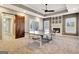 Bright game room with a ping pong table, recessed lights, ceiling fan, and sliding barn door at 550 Wentworth Ct, Fayetteville, GA 30215