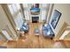 A modern living room with hardwood floors, shutters, fireplace, sofas and stylish decor at 550 Wentworth Ct, Fayetteville, GA 30215