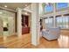 Bright living room with high ceilings and arched windows at 550 Wentworth Ct, Fayetteville, GA 30215