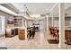 Spacious living room with a large island, full bar, tv and lots of seating at 550 Wentworth Ct, Fayetteville, GA 30215
