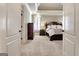 An open doorway leading to a main bedroom suite with plush carpet and decorative trim at 550 Wentworth Ct, Fayetteville, GA 30215