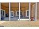 The backyard features a covered patio with a ceiling fan, offering a comfortable outdoor space at 550 Wentworth Ct, Fayetteville, GA 30215