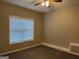 Bedroom with a large window for natural light, complemented by cozy carpeting at 1913 Boulder Ridge Pkwy, Ellenwood, GA 30294