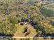 Aerial view of a beautiful home surrounded by lush, colorful trees at 333/337 Old Carrollton Rd, Roopville, GA 30170