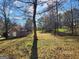 Backyard featuring outbuilding, offering a private and natural setting for recreation at 8380 Cedar Grove & 8400 Teal Road Rd, Fairburn, GA 30213