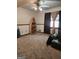 Bedroom with boat shelf for decoration, window for natural light, and carpeted flooring at 8380 Cedar Grove & 8400 Teal Road Rd, Fairburn, GA 30213