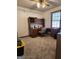 Bedroom featuring built in desk and shelving, plush carpet and a ceiling fan at 8380 Cedar Grove & 8400 Teal Road Rd, Fairburn, GA 30213