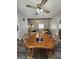 Bright dining area featuring a ceiling fan and view of the front yard at 8380 Cedar Grove & 8400 Teal Road Rd, Fairburn, GA 30213