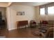 Finished basement area featuring hardwood flooring, classic furniture, and a cozy seating area at 2297 Knob Creek Dr, Snellville, GA 30078