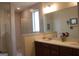 Clean bathroom with a large mirror and double sinks at 2297 Knob Creek Dr, Snellville, GA 30078