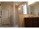 Modern bathroom featuring a walk-in shower and a double vanity at 2297 Knob Creek Dr, Snellville, GA 30078