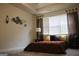 Comfortable bedroom with soft lighting and a plush bed at 2297 Knob Creek Dr, Snellville, GA 30078