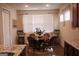 Cozy dining room with a round table and ample natural light at 2297 Knob Creek Dr, Snellville, GA 30078