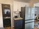 Convenient laundry room features stacked washer/dryer units and modern appliances for efficient laundry management at 6558 Eastbriar Dr, Lithonia, GA 30058