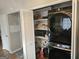 Well-organized laundry room equipped with modern appliances and ample storage space for efficient laundry management at 6558 Eastbriar Dr, Lithonia, GA 30058