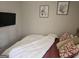Bedroom featuring a bed with decorative pillows and wall art at 6558 Eastbriar Dr, Lithonia, GA 30058