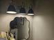 Modern bathroom features a stylish light fixture and elegant decorative mirror and granite countertop at 6558 Eastbriar Dr, Lithonia, GA 30058